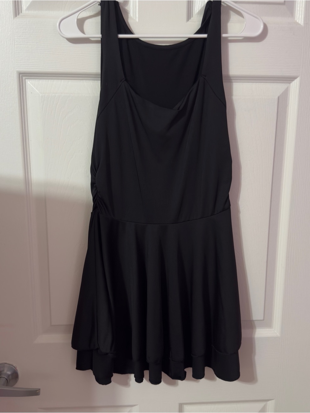 Classic Black Sleeveless Mini Dress with Flared Skirt